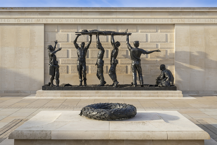 Memorial Sculpture by Ian Rank-Broadley – National Memorial Arbo war memorial in bronze against stone wall